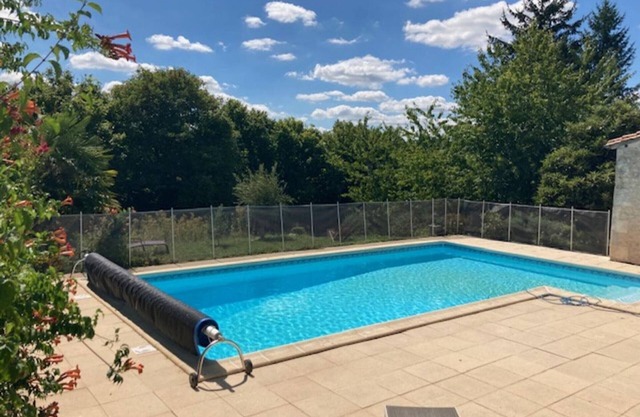Charming Cottage with Private Garden, Shared Pool, and Child-Friendly Amenities