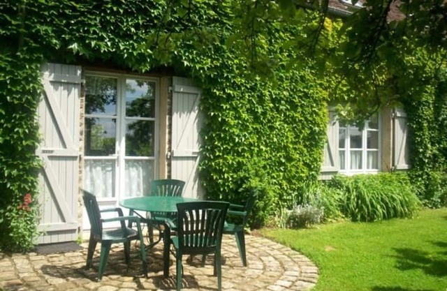 Charming Farmhouse with Fireplace, Garden, and Modern Amenities in Joué-l'Abbé