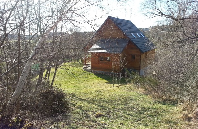 Charming wooden house in a green setting