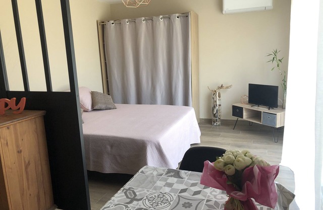 charming little air-conditioned villa with large garden and parking.