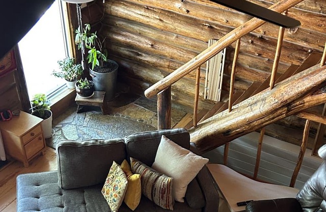 Charming Log Home Nestled in 7 Wooded Acres