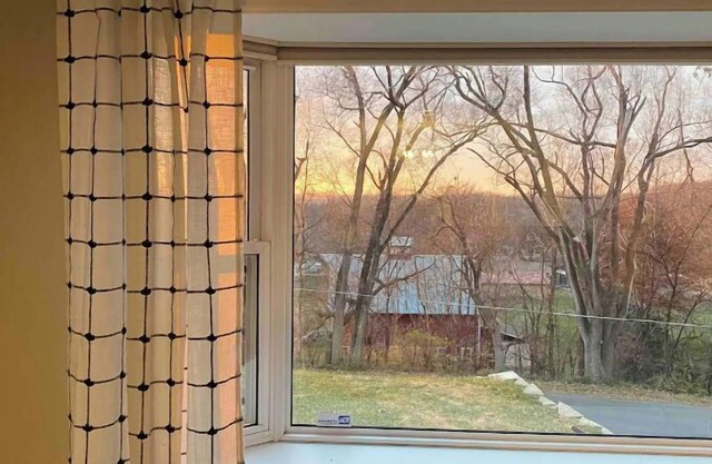 Cheerful two bedroom home in quiet neighborhood. Sun Porch ~ Patio ~ Large yard