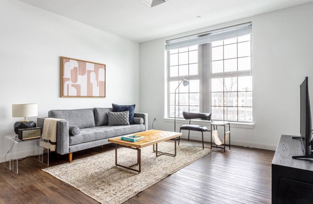 Chic 1BR w/Gym, W/D, Steps from Newtonville Train by Blueground