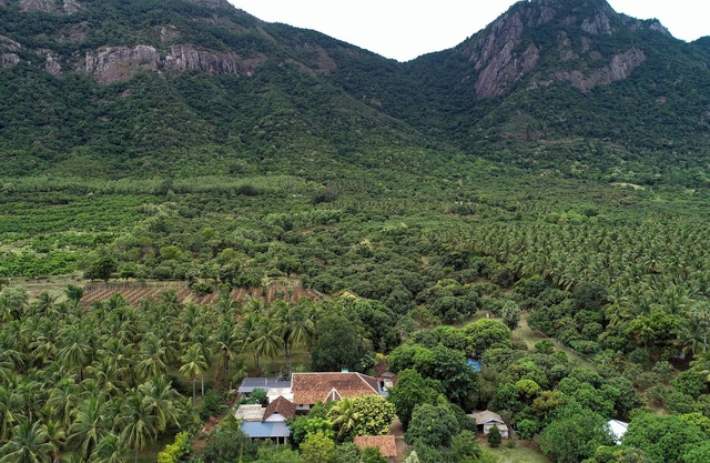 Chic Rustic farmhouse amidst a mango orchard beneath the Western Ghats of India