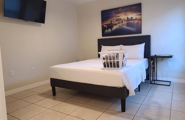 City Lights Queen Bedroom with Shared Lavatory