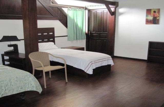 classic balinese house with a beautiful rainforest view!