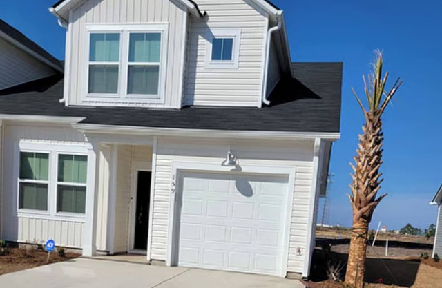 Coastal Charm 3-bedroom townhome with modern comforts and prime location.