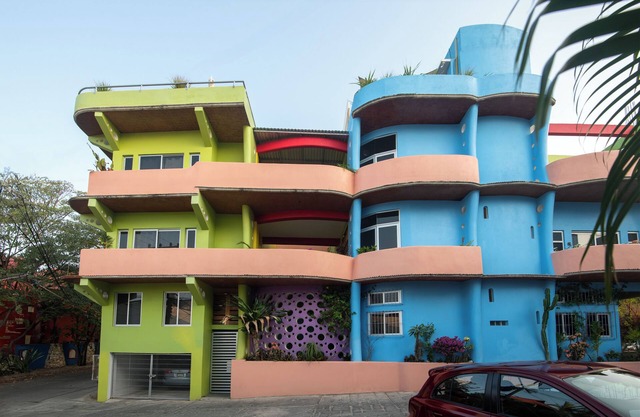 Colorful new home centrally located with breathtaking ocean and mountain views.
