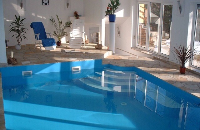 Comfortable apartment with swimming pool and sauna in a quiet location