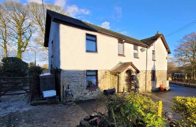Comfortable character cottage with small garden on smallholding. Pets welcome.