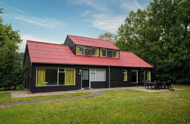 Comfortable house in a wooded holiday park