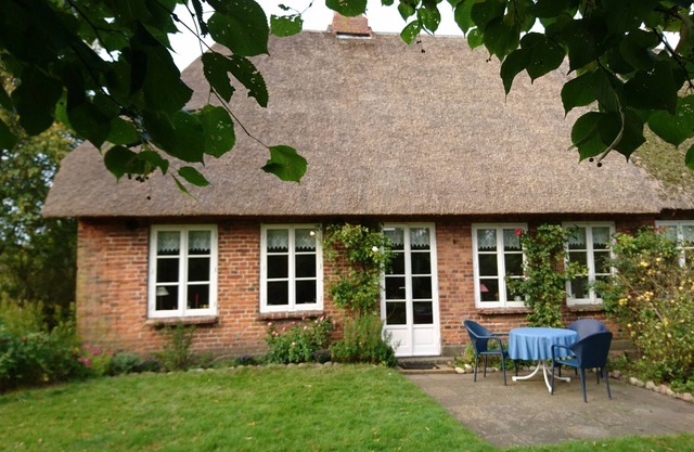Comfortably furnished thatched roof house with a large garden