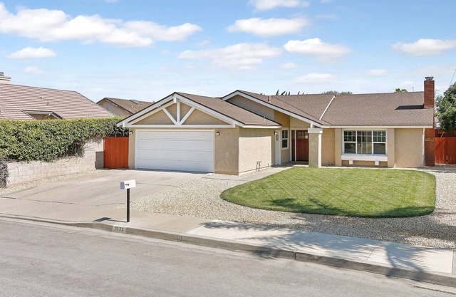 Completely remodeled 4 bedroom house with 2 car garage.