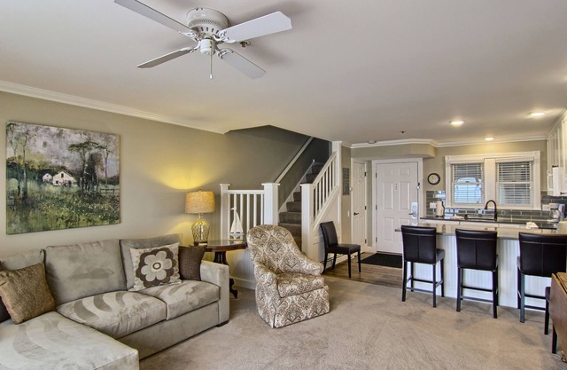 Condo with Lake Charlevoix Views | Private Beach Access | Gas Log Fireplace