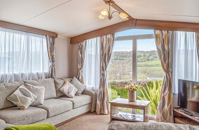 Contemporary, stylish caravan with one double and one twin.