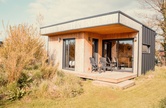 Cottage in front of water