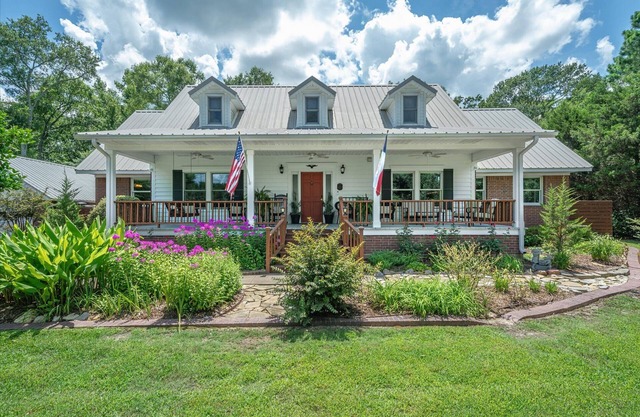 Country Charmer with Inviting Front and Back Porches, Swim Spa, Decks, Fire Pit