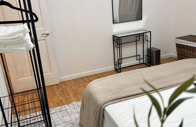 Cozy 1-BR apartment in charming Valley Stream and optional car rental on site.