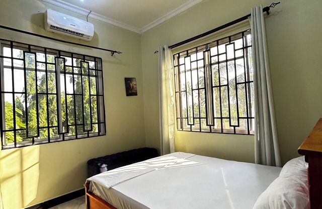 Cozy 2-bedroom apartment with AC, WiFi in awesome Dar es Salaam