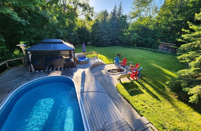 Cozy 2 bedroom basement with pool, jacuzzi, gym & sauna. Come see the chickens