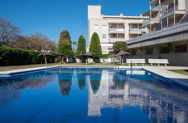 Cozy Apartment with A/C, Pool, and Parking 280m from the Beach