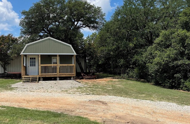 Cozy cabin with 1 bedroom and WiFi, AC & located on 40 acres with great views.