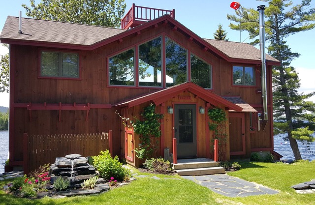 Cozy Lakeside Home offers unbeatable location feet from Moosehead Lake