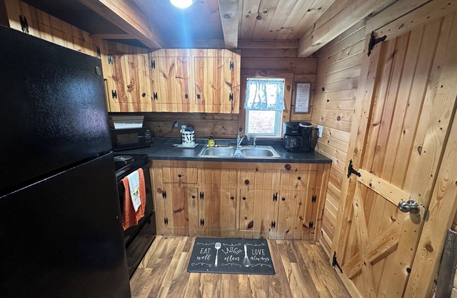 Cozy log cabin located in downtown Moravia, Iowa.