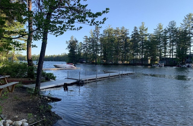 Cozy year round cottage on Square Pond with gradual sandy beach.