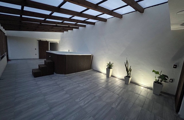 Create great moments in this beautiful space and enjoy the Jacuzzi.