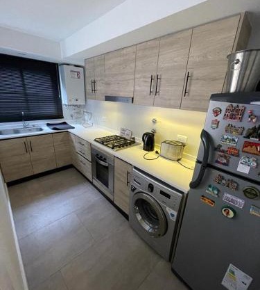 Departamento Moderno - Equipado y Con Cochera Privada