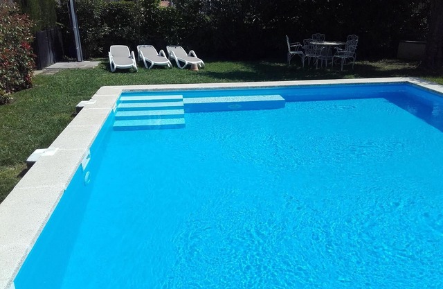 Detached house with a large garden and a huge pool