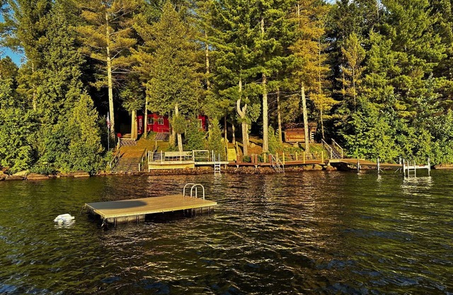 Direct waterfront overlooking forever wild forest on a hidden dead end street