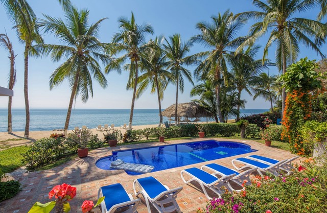 Directly on beautiful beach, with chef and car to drive.