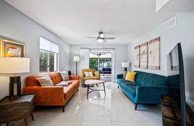Dog-friendly colorful condo with shaded patio, washer/dryer, & central AC