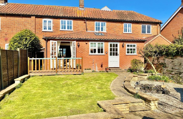 Dog-friendly cottage in charming village, with country walks and close to coast