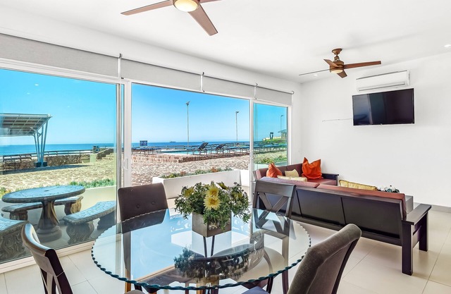 Dog-friendly oceanfront villa with pool access, rooftop patio, full kitchen