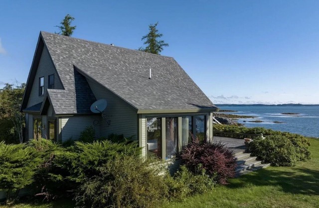 Dramatic Ocean views from every room of this cozy post&beam Oceanfront property.