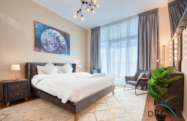 Elegant Studio in Al Jawhara Tower JVT by Deluxe Holiday Homes