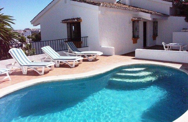 Enchanting villa with private pool and stunning views, close to beach.