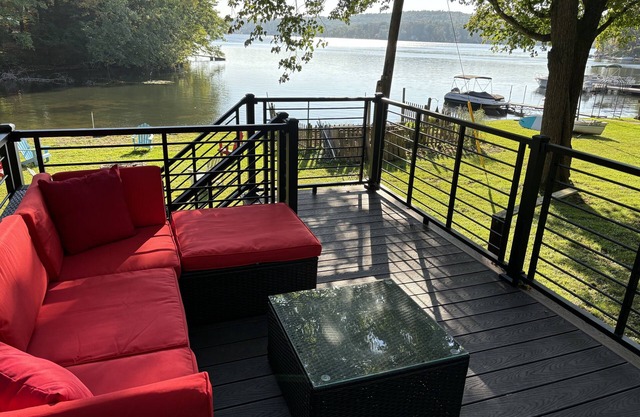 Enjoy a spectacular view of Burden Lake, NY while relaxing inside or outside.