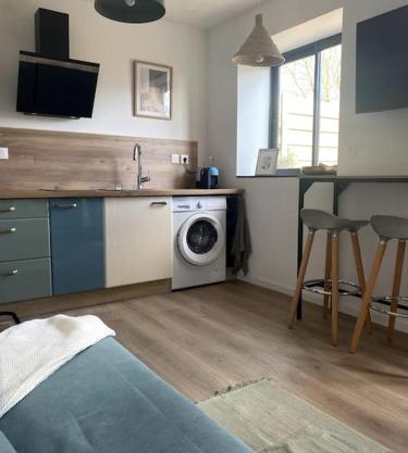 Entre ville et campagne appartement cosy avec parking et terrasse Wood