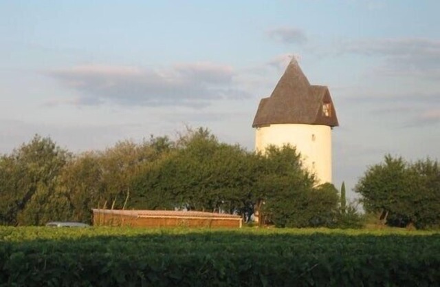 Equipped windmill with view of the Gironde estuary