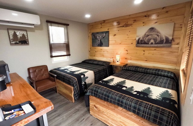 Escape to the tranquility of our cozy cabin inn, where rustic charm meets modern comfort. Experience a home away from home ambiance.