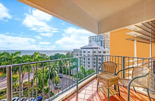 Esplanade Poolside Living with Lush Balcony Vistas
