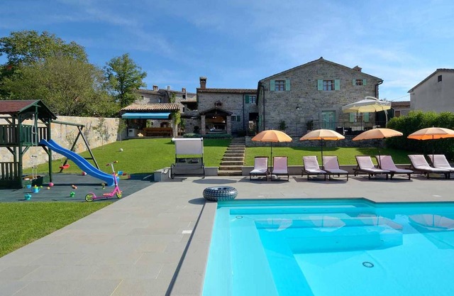 Estate with four stone villas and swimming pool
