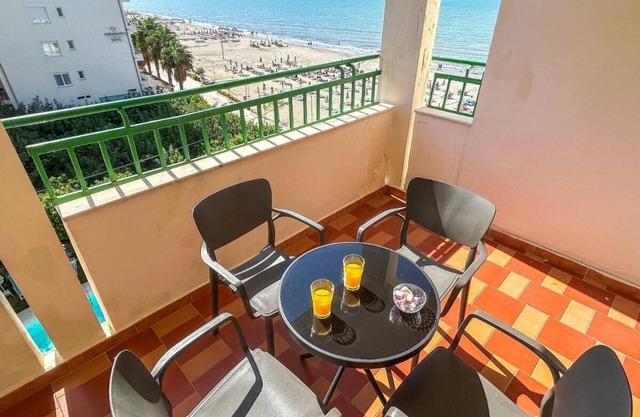 Exceptional 2-Bedroom Beachfront Apartment with Sea View, WiFi & AC