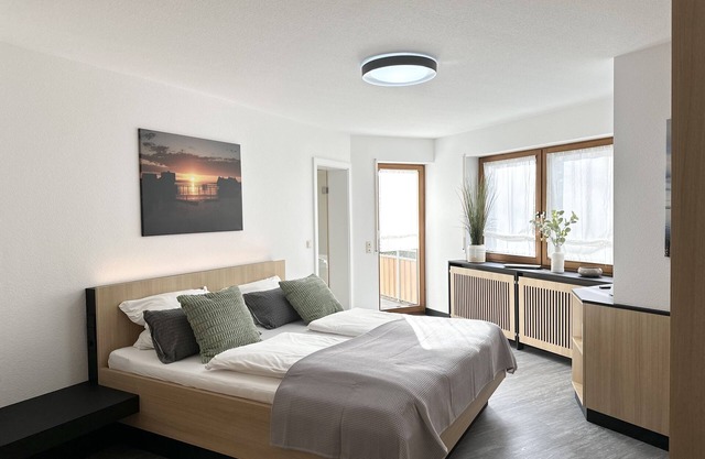 Exclusive 2-room apartment Pfahlbauten 1 with 2 balconies and 2 TVs