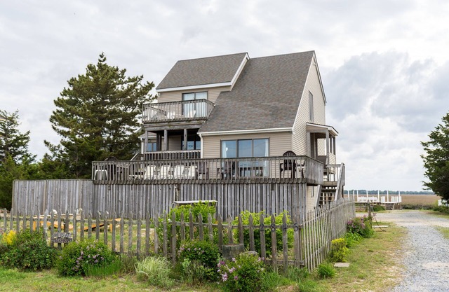 EXCLUSIVELY YOURS! Private Beach Path, Double Water Access, and Dog Friendly.