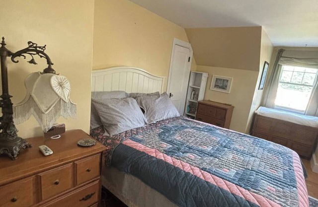 Experience Classic Charm in a Cozy 115-Year-Old Colonial